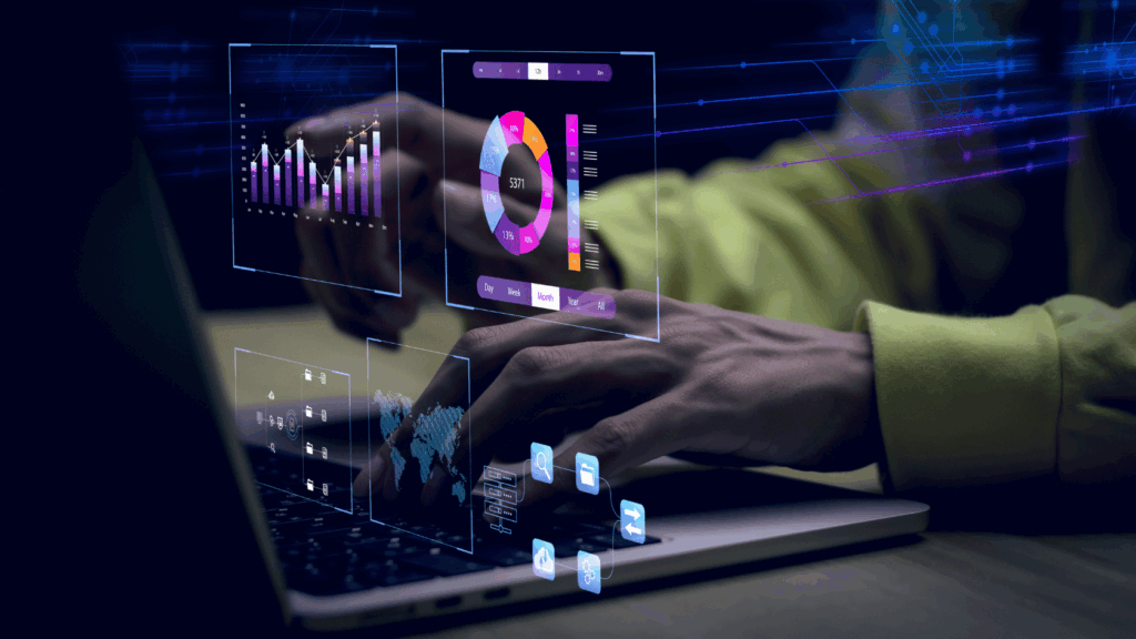 Hands typing on a laptop while translucent, neon-lit dashboards—bar chart, donut graph, world map, and file-flow icons—hover above the keyboard, illustrating AI-powered analytics turning raw data into actionable insight.